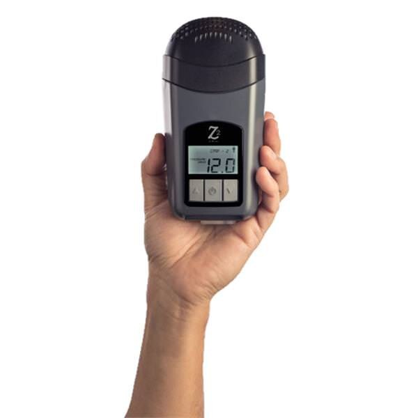 CPAP User Holding Z2 CPAP Machine